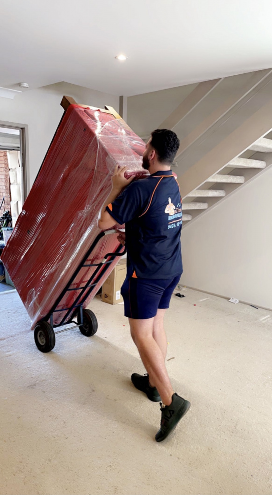 Warehouse removalists handling commercial equipment and stored goods