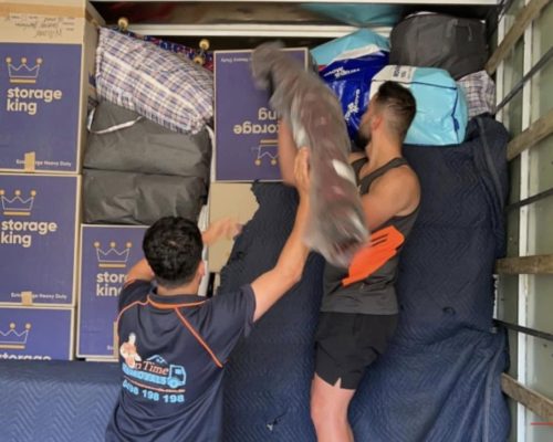 Warehouse removalists handling commercial equipment and stored goods