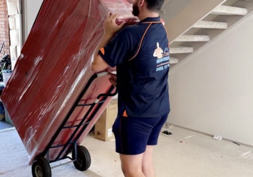 Warehouse removalists handling commercial equipment and stored goods