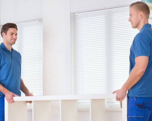 Furniture movers helping families relocate household appliances and furniture